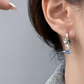 🌙✨ Hängende Creolen mit Sternenmotiv – 🌟 funkelnde Zirkonia-Sterne | 💫 leicht schwingend & glamourös | 💖 perfekt fürs Nachtleben oder Dates